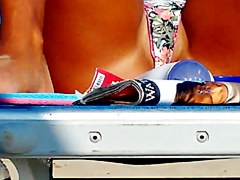 Hot girl spreads her legs in front of me at the beach