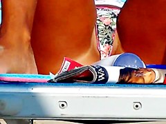 Hot girl spreads her legs in front of me at the beach