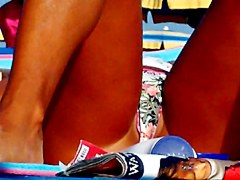 Hot girl spreads her legs in front of me at the beach