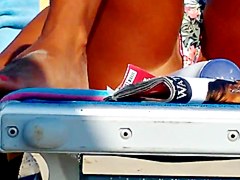 Hot girl spreads her legs in front of me at the beach