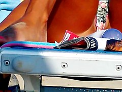 Hot girl spreads her legs in front of me at the beach