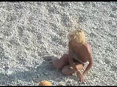 Voyeur on public beach. Funny dancing