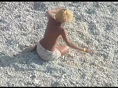 Voyeur on public beach. Funny dancing