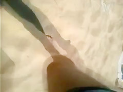 Mature beach voyeured topless (caught!)