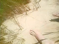 Mature beach voyeured topless (caught!)