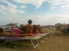 Perfect tan ass on the beach