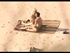 Voyeur on public beach. Hot young couple sex2