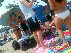 2 bikini friends at the beach candid