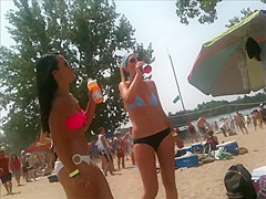 2 bikini friends at the beach candid