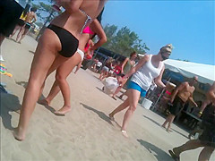 2 bikini friends at the beach candid