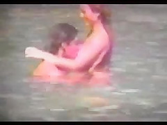 Young Couple Nude in Water