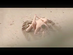 Voyeur on public beach. Hot young couple sex1