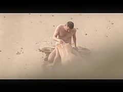 Voyeur on public beach. Hot young couple sex1