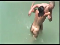 Couples have sex on beach