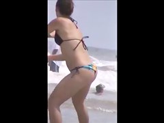 nice beach ass tossing frisbee, jiggly butt 32