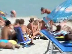 Nice young tits - beach voyeur video