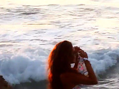 Changing clothes in the beach