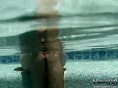 Babe on lilo naked in the sun