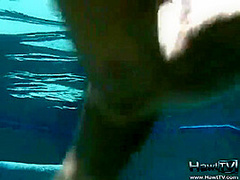 Babe on lilo naked in the sun