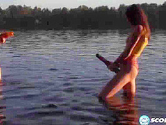 Erika and Margo, both 19, have hardcore lesbian sex outdoors complete with tit sucking, pussy licking and fingering next to a lake.