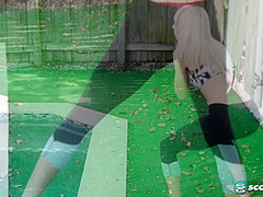Yoga chick Sveera stretches outside and then loses her yoga clothes, spreads and fingers her snatch.