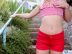 Jenny Wild strips outdoors in Prague, showing every inch of her insanely great body before she fingers her slit on stone steps.