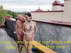 small ass stretched on a public rooftop