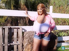 Africa Gets Out Her Giant Tits Outdoors And Plays With Her