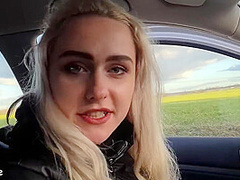 A fair-haired female traveler accepted a ride and subsequently engaged in a provocative sexual encounter within the veh