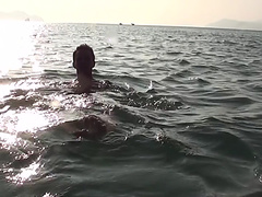 Anne in sex on the beach with a nice-looking babe