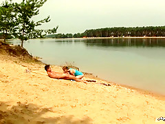Couple of teens fuck on the beach