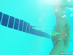 MILF in public pool before porn shoot