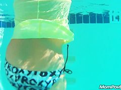 MILF in public pool before porn shoot
