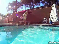 MILF in public pool before porn shoot