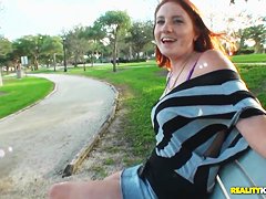 Hot read head Lindsey seduces Josh by showing him her laps and shoulders