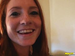 Hot read head Lindsey seduces Josh by showing him her laps and shoulders