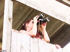 Innocent looking teen babe munching on a dirty old man's hard cock outdoors