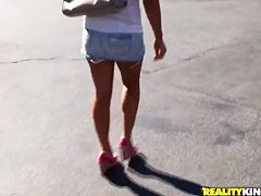 Britney Sanders drinking some coffee and having a ride through the town