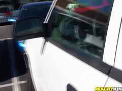 Britney Sanders drinking some coffee and having a ride through the town