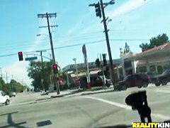 Britney Sanders drinking some coffee and having a ride through the town
