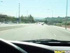 Britney Sanders drinking some coffee and having a ride through the town