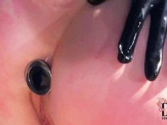 Latex Lucy fucks Samantha Bentley in garden