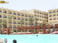 Bunch of chubby female asses swim in the pool