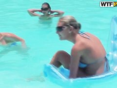 Bunch of chubby female asses swim in the pool