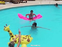 Bunch of chubby female asses swim in the pool