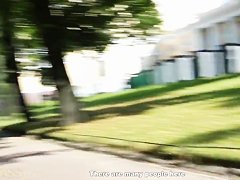 Cute curly brunette Leonora shows her boobs in park