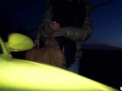 A young girl is offered cash for sex in a lot
