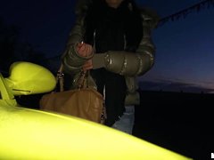 A young girl is offered cash for sex in a lot