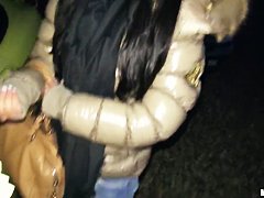 A young girl is offered cash for sex in a lot