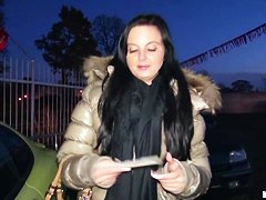 A young girl is offered cash for sex in a lot